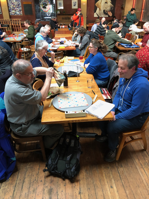 PDX Scrabble club members gathered around a table
